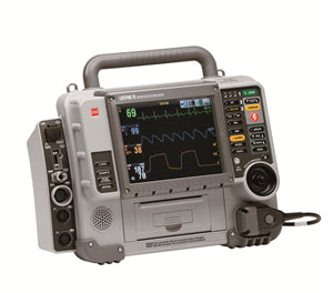 The Physio-Control LIFEPAK 15 Monitor/Defibrillator by Physio-Control/STRYKER, equipped with Masimo Rainbow SET technology, features a screen displaying heart rate and other vitals, along with buttons and a handle for convenient use in emergency care.