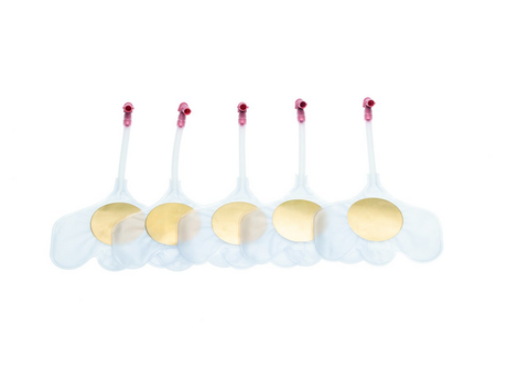 Five little Baby QCPR Lungs from Laerdal, evocative of earlier designs, neatly arranged in a row.
