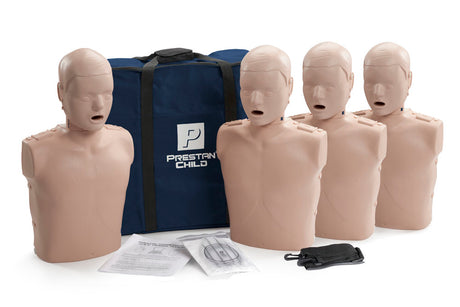 Four Prestan Professional Series Adult Training Manikins with open mouths, featuring the audible compression clicker, positioned in front of a navy blue Prestan Professional bag.