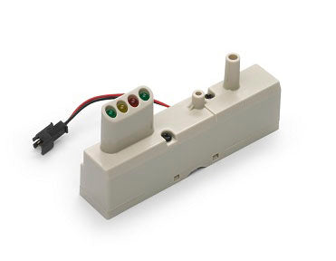 The Monitor for Prestan Adult Manikin by Prestan is a beige electronic connector equipped with red, yellow, and green LEDs. It includes a black wire with a plug, making it ideal for monitoring CPR practice sessions. This device integrates smoothly with the Prestan Professional Monitor to enhance feedback on student performance.
