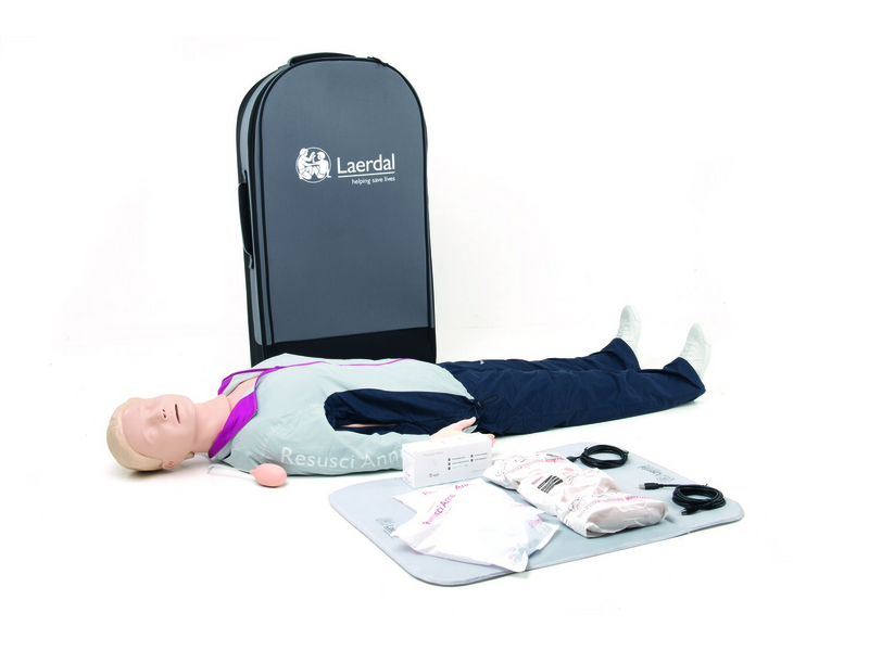 Resusci Anne QCPR Full Body – Rechargeable by Laerdal, featuring CPR feedback and a defibrillation training system, including a carrying case and various accessories displayed on the ground.
