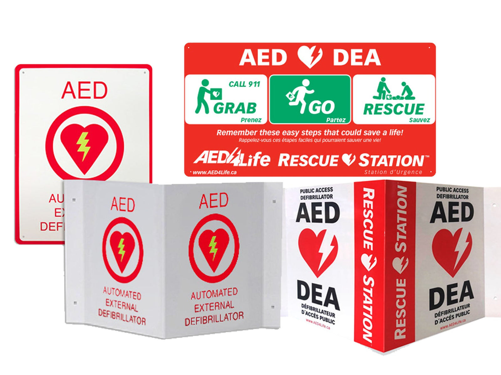 Various AED (Automated External Defibrillator) signs in red and white with heart and lightning bolt symbols.