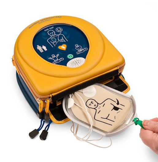 The HeartSine Samaritan 360P - Complete Package, featuring its open case with visible pads and a helpful instructional diagram, employs sophisticated AED technology for emergency situations.