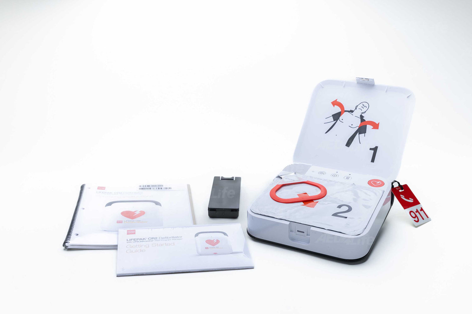 Physio-Control/STRYKER LIFEPAK CR2 Bilingual Complete Package includes a LIFEPAK CR2 AED with cprINSIGHT, manuals, battery, and “911” tag, all displayed on a white background.