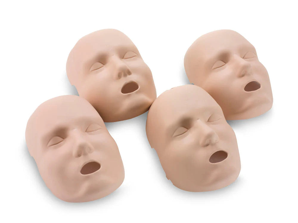 Four Prestan face skin replacements for the Professional Adult Manikin in medium skin tone, set against a white background.