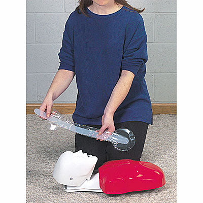 A person skillfully demonstrates the CPR technique using Basic Buddy products on a mannequin atop a carpeted floor, ensuring every step is executed flawlessly. This essential life-saving skill is a vital part of any well-rounded first aid package, equipping individuals to confidently handle emergencies with Basic Buddy enabling effective practice.