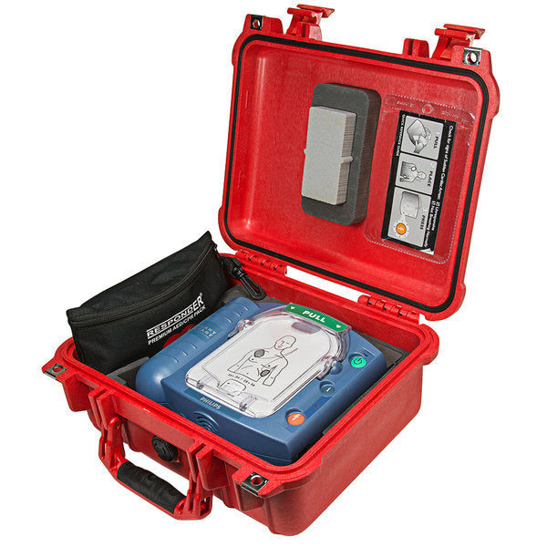 The Philips Hard-Sided Carry Case by Philips is a red, watertight emergency case designed to hold a defibrillator, instructions, and an accessory pouch for added protection.