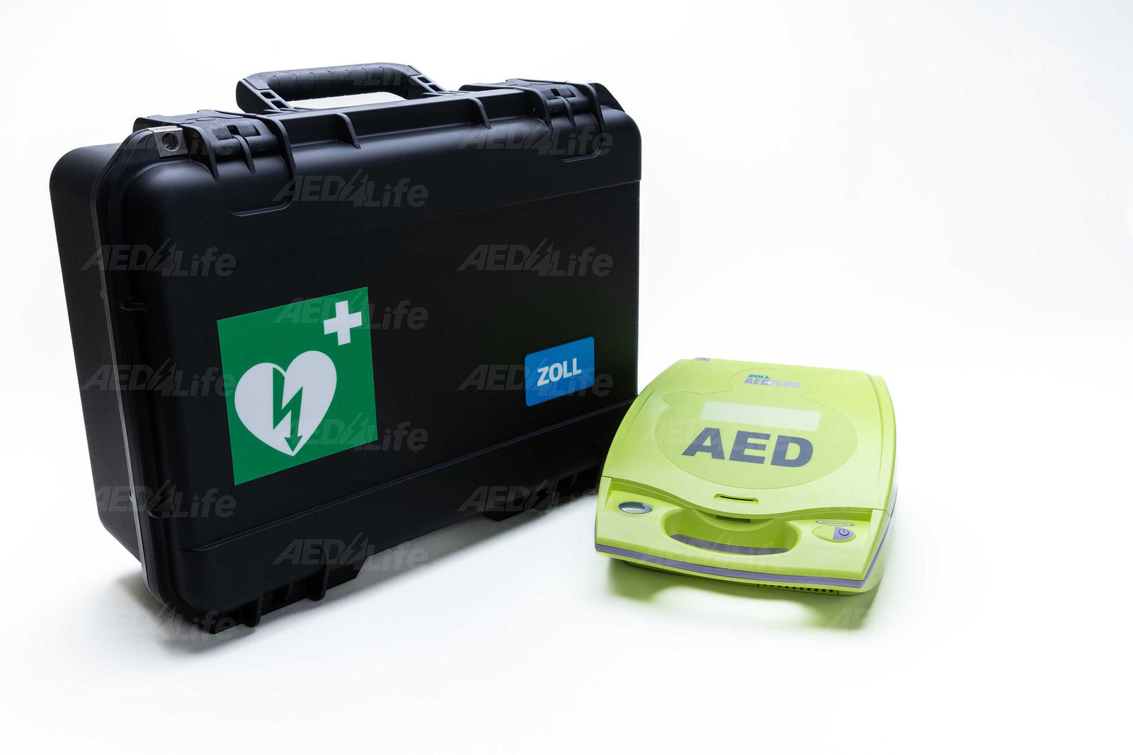 The black ZOLL AED Plus Small Pelican Case, known for its shock resistance, sits beside the green ZOLL AED Plus device on a pristine white background.