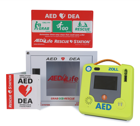 ZOLL AED 3 - Complete Package by ZOLL, includes a sign, a white AED cabinet, and a yellow ZOLL AED 3 Automated External Defibrillator with CPR feedback and an easy-to-carry handle.