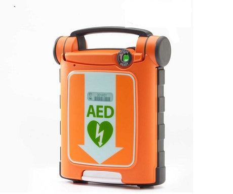 The orange Encore Series Cardiac Science G5 BILINGUAL AED (Recertified) includes a handle and a heart symbol on the front, featuring Rescue Ready technology to ensure its constant preparedness. Equipped with integrated RescueCoach instruction, it provides step-by-step guidance during emergencies.