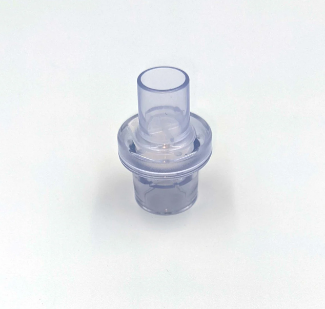 A clear plastic CPR Mask Replacement One-way Valve (qty 50) by AED Shop, designed to fit any CPR mask, set against a plain white background.