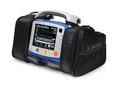 The ZOLL X Series Defibrillator Encore Series (Recertified) from Zoll, featuring Real CPR Help technology, includes a screen displaying vital signs and comes conveniently packed in a carrying case to offer crucial support during cardiac arrest emergencies.