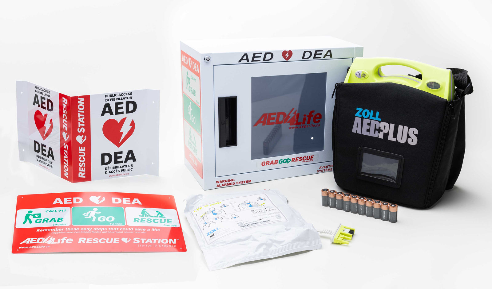 The ZOLL AED Plus - Complete Package by ZOLL includes a wall cabinet, rescue station signs, batteries, pads, defibrillator bag, and provides real-time CPR guidance.